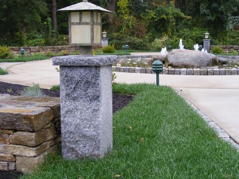 Low profile Woodbury Gray granite lamp posts with optional granite caps light this water feature and walkway in the back of an assisted living facility. #lamppost #outdoorlighting #landscapelighting #granite Driveway Posts, Caledonia Granite, Walkway Lighting, Patio Entertaining, Driveway Lighting, Dock Lighting, Grey Lamp, Rustic Fence, Lamp Post Lights