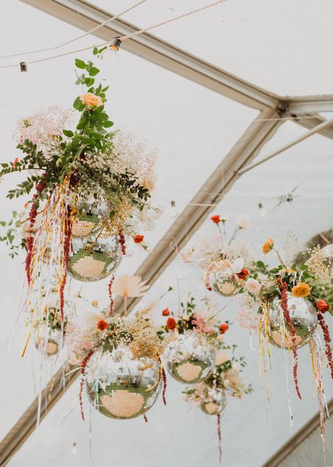 Elegant Winter Wedding With A Disco Ball Ceiling | Junebug Weddings Fall Disco Ball, Flower Disco Ball, Floral Disco Ball, Reception Outfit Change, Disco Ball Ceiling, Disco Wedding Theme, Disco Ball Wedding Decor, Wedding Disco Ball, Garden Disco