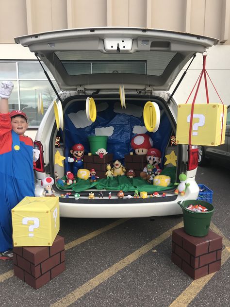 Super Mario themed trunk for trunk or treat! Mario Kart Trunk Or Treat, Trunk For Trunk Or Treat, Trunker Treat Ideas, Halloween Car Decorations, Church Trunk, Trunk Or Treat Ideas, Hallowen Ideas, Green Tablecloth, Mario Birthday Party