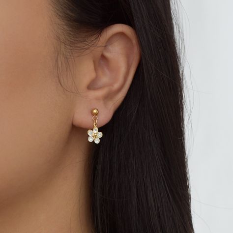 These earrings are handmade to order and are customizable. For custom requests, please message me for details.  May your day be as sweet as these Daisy Earrings which feature dangling gold daisy flowers with surgical steel earring posts and 14K gold plated brass flower charms.  There's a matching daisy necklace here:  https://www.etsy.com/listing/666142160/daisy-necklace-flower-pendant-gold-daisy --------------------♥ PROMOS ♥-------------------- Want 10% off? Join the mailing list by visiting h Gold Daisy Earrings, Small Gold Earrings, Small Earrings Gold, Flower Earrings Gold, Daisy Necklace, Jewelry Accessories Ideas, Daisy Earrings, Daisy Flowers, Gold Earrings Designs