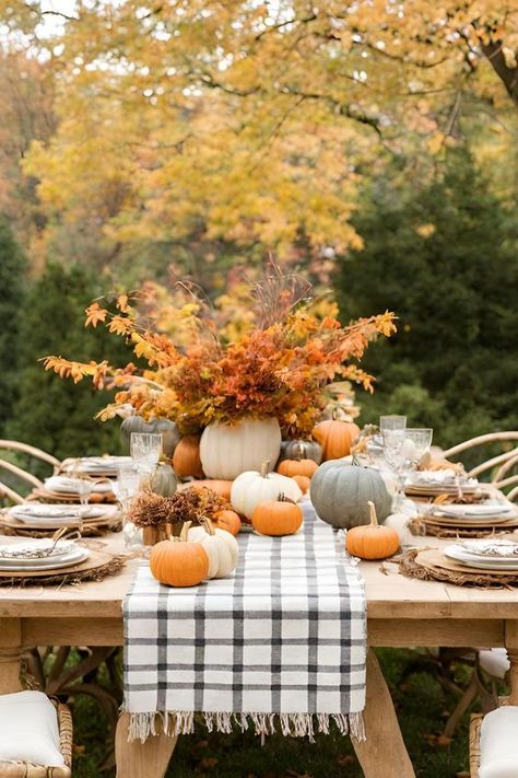 21 Outdoor Fall Decorating Ideas - Outdoor Fall Table Set with Pumpkins and Leaves Fall Outdoor Dining Table Decor, Outdoor Fall Table Decor Ideas, Hosting An Outdoor Fall Party, Outdoor Thanksgiving Tablescapes, Thanksgiving Dinner Outdoors, Fall Patio Table Decor, Fall Picnic Table Decor, Fall Outdoor Tablescapes, Fall Themed Party Decor