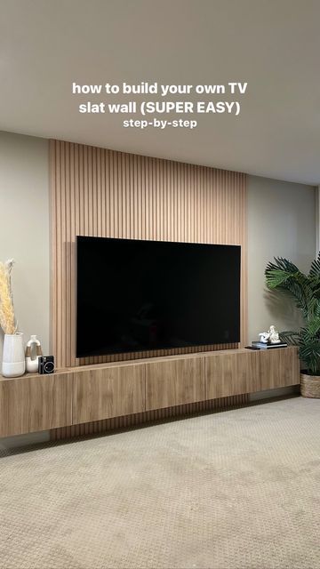 Tv Inserted In Wall, Tv On Paneled Wall, Wall Mounted Tv Panelling, Console Behind Tv, Slatted Wall Tv, Tv Wall Build Out, 75 Inch Tv On Wall Ideas Mounted, Tv Mount Wall Ideas, Floating Wall Tv