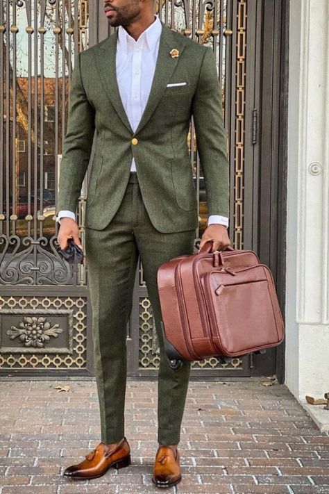 Man wearing a green suit.