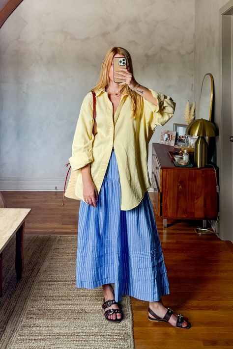 Big shirt, big skirt is my vibe for summer. I love this Dôen sebastian skirt in blue stripe, it is so soft and comfortable. I paired this midi skirt with a vintage men's oversized button down and stuck with blue and yellow for color blocking. This is an easy summer outfit that is chic and perfect for lunch dates or running to the farmers market. #coastalaesthetic #europeansummeraesthetic #sezanelovers • European summer outfits • french girl fashion • casual chic outfit ideas • butter yellow • Dress And A Shirt Outfit, Oversized Shirt And Midi Skirt Outfit, Skirt Outfits 2024 Summer, Collared Button Up Shirt Outfit, Doen Sebastian Skirt, Blue Striped Outfit, Full Coverage Summer Outfit, Long Skirt Button Up Shirt, Button Down Shirt Over Dress Outfit