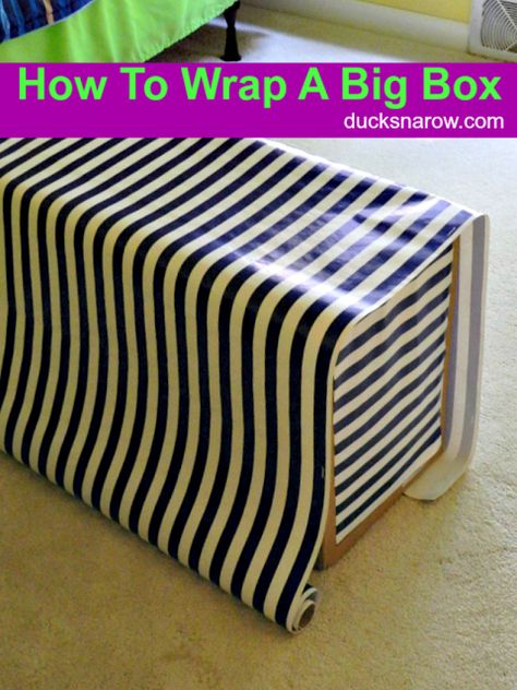 Big box with wrapping paper Packing Big Gifts Ideas, How To Wrap Oversized Gifts, Wrapping A Large Gift, Gift Wrap Large Box Ideas, Gift Wrap Big Box Packaging Ideas, How To Wrap Large Boxes, Wrap Big Box Gift, Wrapping Large Presents, Gift Wrapping Large Boxes