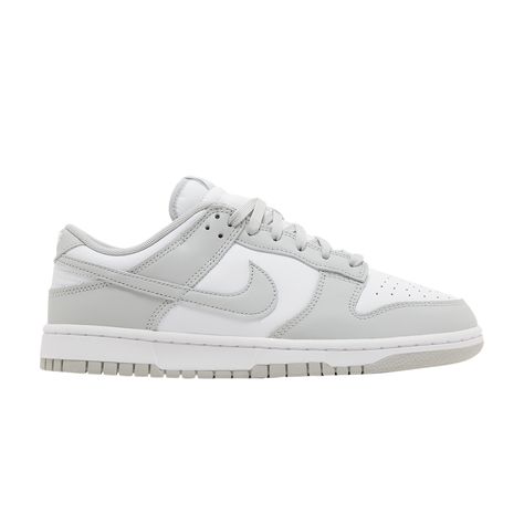 Find NIKE Dunk Low ' Fog on Editorialist. The Nike Dunk Low ‘Grey Fog’ delivers a subtle two-tone colorway of the classic silhouette originally released in 1985 as a college hoops shoe. The all-leather upper is treated to a pristine white base with contrasting overlays in a light grey shade. The same neutral tone is repeated on the Swoosh, laces and woven Nike tongue tag. Additional Nike branding lands on the heel tab and padded sockliner. The low-top rests on a standard rubber cupsole that pairs white sidewalls with a grey rubber outsole. Shoes Dunks Low, White And Grey Dunks, Light Grey Dunks, Grey Low Dunks, Nike Grey Shoes, Grey Fog Dunks, Gray Dunks, Grey Nike Dunks, Low Dunks Outfit