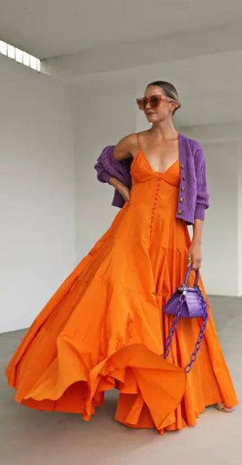 Orange button up maxi dress + purple cardigan and handbag Makeup Orange Dress, Orange Dress Makeup, Makeup Look Orange, Ropa Color Neon, Orange Dress Outfits, Makeup Orange, Off Shoulder Ball Gown, Colour Combinations Fashion, Color Blocking Outfits