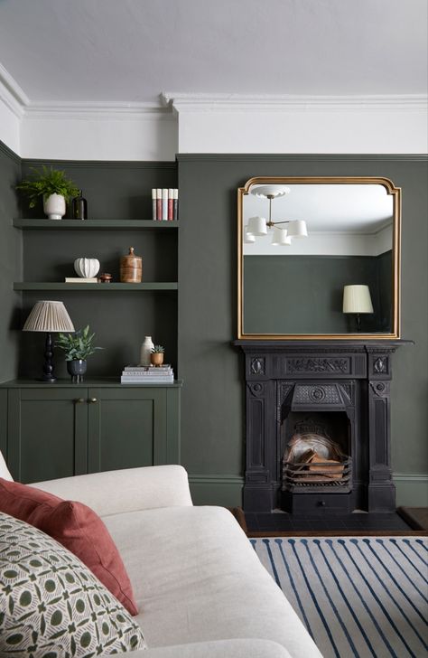 Victorian townhouse family living room - dark green walls provide an enveloping and cosy feel as well as a timeless appeal. Exterior Colour Schemes, Edwardian Living Room, 1930s Living Room, Dark Green Living Room, Moody Living Room, Snug Room, Victorian Living Room, Dark Living Rooms, Victorian Townhouse