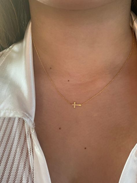 Small Cross Necklace / 14k Gold Sideways Cross Necklace / Mini Gold Cross Necklace / Baptism Gift / Communion / Confirmation / Confirmation    Free Shipping   within the USA Handmade beautiful minimalist 14k solid yellow gold sideways cross.  The chain is 14k solid gold which is adjustable with a spring lock.   The total length is 18 inches with a loop on 16 inches.  AS IT IS WITH THIS ITEM ALL MY PIECES ARE HAND MADE. AND I STAND BEHIND EVERY PIECE. SATISFACTION GUARANTEED. FIND OUT ABOUT OUR L