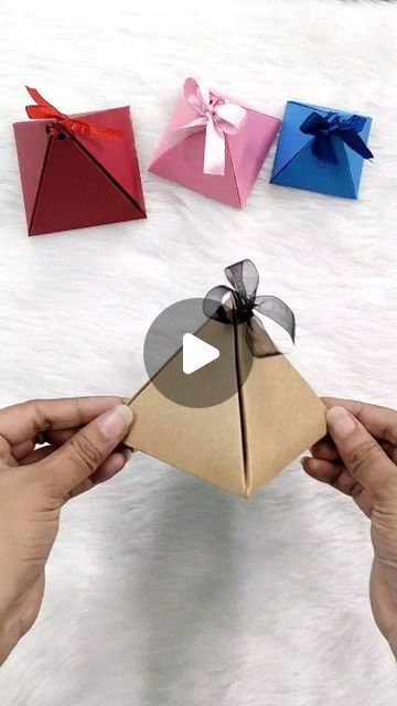 THE PAPER MAGIC on Instagram: "DIY PYRAMID BOX ❣️ EASY AND SIMPLE METHOD TO GIFT YOUR FRIENDS ❣️ BEST FOR KIDS TO TRY 😍 Materials @thepapermagic_supplies #craftideas #crafting #flowers #flowersfordecoration #christmas #christmasdecor #love #uniqueart #decorationideas #glitterflowers #reelitfeelit #reelsinstagram" Diy Pyramid, Crafting Flowers, Pretty Gift Wrapping Ideas, Pyramid Box, Gift Wrapping Techniques, Creative Gift Wraps, Seni Dan Kraf, Gifts Wrapping Diy, Gift Box Template