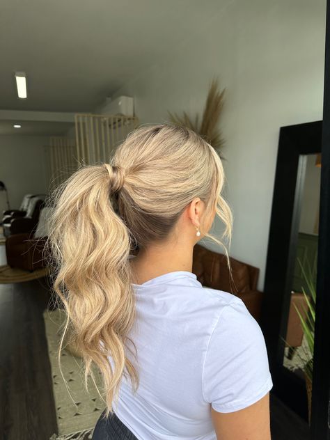 The bride's hair for her rehearsal dinner the night before her big day❤️ Fancy Curled Ponytail, Slick Back Curled Ponytail Prom, Mid Ponytail Wedding Hair, High Ponytail Homecoming Hairstyles, Messy Ponytail Wedding Hair, High Pony For Prom, Hoco Ponytails High, Sleek Ponytail Bridal Hair, Elegant Prom Ponytail