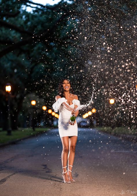 Graduation Photoshoot Champagne, Champagne Bottle Graduation Picture, Graduation Photos Outfit Ideas, Sfa Graduation Pictures, Champagne Pop Graduation Picture, Graduation Photos Masters, Classy Graduation Photoshoot, College Graduation Pictures Ideas Creative, Southern University Graduation Pictures