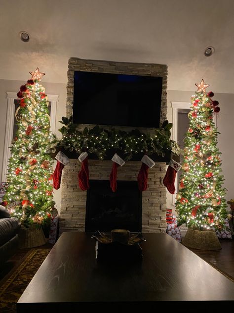 Twin Christmas Trees, Two Christmas Trees In Living Room By Fireplace, Holiday Fireplace Garland, Christmas Tree Fireplace Decor, Christmas Trees On Each Side Of Fireplace, Decorate Sides Of Fireplace, Christmas Trees By Fireplace, Two Christmas Trees By Fireplace, Christmas Tree Next To Fireplace