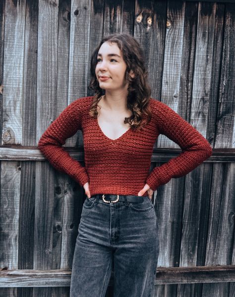 My latest finished crochet! 🧶 I have just finished this gorgeous new top and couldn't wait to share it with all of you! It features a V neck, fitted body and large feature bow at the back! Pattern: @knitsnknotswpg #burningemberssweater 🔥 Yarn: I actually can't remember, I started last year and threw away the label (oops!). I remember that it was a wool-acrylic blend and the colour was called Brick. What is your most recent crochet project? Let me know in the comments! ⬇️ #moderncrochets... V Neck Crochet, Modern Knitting, New Top, Crochet For Beginners, The Colour, Crafty Stuff, Crochet Sweater, The Label, Crochet Projects