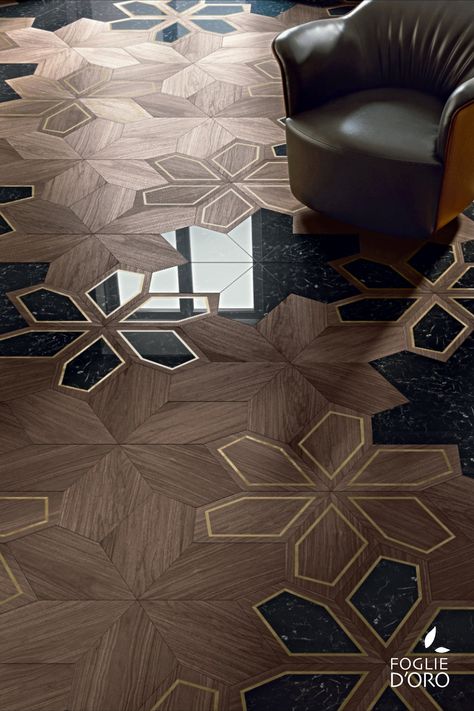 Nature is the main aesthetic inspiration in @fogliedoro design research. Azalea modular geometric wood floor - with marble and metal inserts - is the clearest expression of the refined craftsmanship of a design floor pattern. Azalea is patented by Foglie d'Oro. #fogliedoro #woodflooring #woodfloors #naturewood #solidwood #italianinteriors #italianfloors #madeinitaly #geometricwoodfloor #craftsmanship #floorpattern #modularfloors #marblefloor #woodpanels #designpanels #solidwalnutfloor Luxury Marble Flooring, Luxury Hotels Interior, Inlay Flooring, Oak Timber Flooring, Marble Flooring Design, Wood Floor Design, Engineered Timber Flooring, Geometric Floor, Luxury Flooring