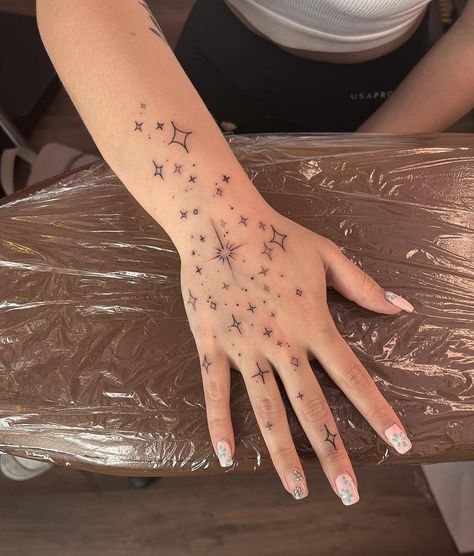 I love doing starry hands ✨🌙 thanks Louisa x | Instagram Mystical Finger Tattoos, Hand Tattoo Constellation, Chandelier Hand Tattoo, Stars On Hands Tattoo, Stars Hand Tattoos For Women, Finger Tattoos Sparkle, Starry Tattoos For Women, Constellation Tattoo On Hand, White Stars Tattoo