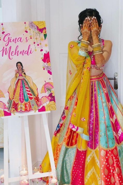 We are obssessed with how this bride’s mehendi artwork is replicating her mehendi day look ! Always dreamed of your Mehndi to be a colorful, boisterous affair? Well, you don't always need an OTT decor to spread that vivaciousness & quirk, when your attire can do the magic. Why dress basic even if it is an intimate, low-key celebration? Mehandi Outfits, Haldi Ceremony Outfit, Haldi Dress, Mehndi Outfit, Mehendi Outfit, Haldi Outfits, Haldi Outfit, Mehendi Outfits, Desi Wedding Decor