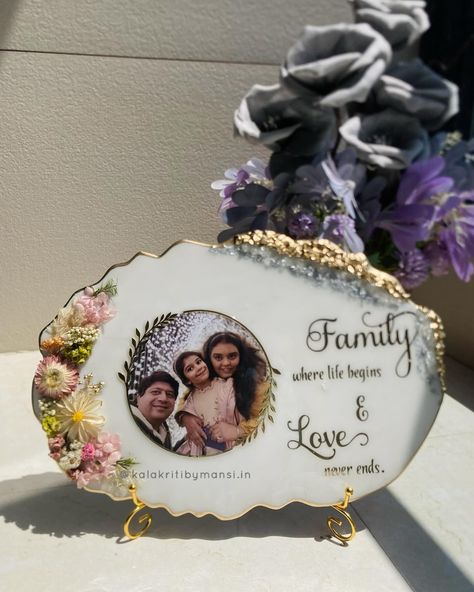 Family, where Life begins & Love never Ends🦋🙈🥹!! We are glad that we have added this beautiful frame in “ The Family” gift section , although family gifting is underrated!! Where @nehald85 ma’am ordered this one for her Bhai & Bhabhi …. , who lives abroad . [giftfor family , family time , floral gifts , unique gifts , gift ideas , resin frame , photo frame , resin frame with stand , desk frame , desk Gifts , desk accessories, table stand , frame with stand ] #resinart #resinphotoframe ... Resin Family Photo Frame, Photo Frame Resin Art, Family Photo Frame Ideas, Resin Frame Ideas, Resin Photo Frame Ideas, Resin Art Photo Frame, Resin Gift Ideas, Resin Picture Frame, Photo Frame Heart