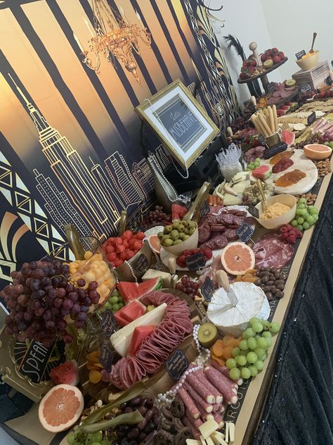 Charcuterie board for a great gatsby birthday party. 1920s Charcuterie Board, Great Gatsby Dinner Party Food, Great Gatsby Party At Home, Roaring 20s Charcuterie Board, Food For Great Gatsby Party, Roaring 20s Mystery Party, Great Gatsby Charcuterie Board, 20s Themed Party Food, Roaring 20s Themed Birthday Party