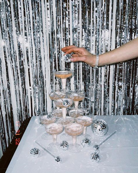 Sparkling shimmery background with disco balls placed on and around champagne tower Champagne Birthday, 21st Bday Ideas, Disco Birthday Party, 25th Birthday Parties, Disco Party Decorations, 21st Party, Disco Theme, Bday Party Theme, Nye Party