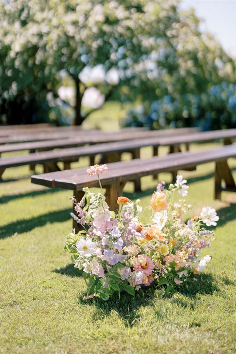 Larkspur, zinnias, sweet peas, dahlias, pansies, cosmos, phlox, flowering oregano, nicotiana artfully deisgned into a stunning summer growing arrangement for the wedding aisle. Summer Wedding Flower Arrangements, Vibrant Summer Wedding, Whimsical Wedding Flowers, Dahlias Wedding, Neutral Wedding Flowers, Sustainable Flowers, Colorful Wedding Flowers, Skagit Valley, Aisle Flowers