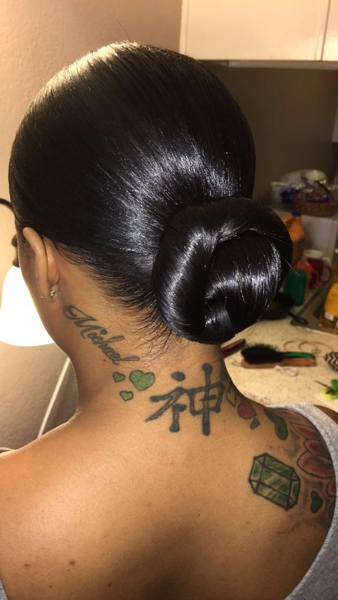 Low Bun Ponytail Hairstyles For Black Women, Black Women Hair Buns, Lower Bun Hairstyles Black Women, Low Middle Part Bun Black Women, Sleek Low Bun Black Women Middle Part, Slicked Back Bun Black Women, Slick Back Bun With Extensions, Bun Extensions Black Women, Low Bun With Extensions