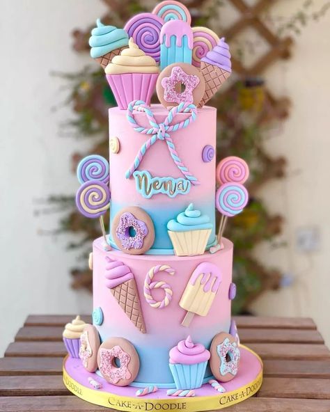 Top Cake Blog on Instagram: "Candy store 🍭🍫🍡🍭🍬🍫 Reposted from @cakeadoodle.qa Candyland. Express it with a cake @cakeadoodle.qa . #cakes #cake #cakedecorating…" Two Tier Donut Birthday Cake, Candy Birthday Theme Party, Candy Theme Cupcakes Ideas, Candyland Party Cake, Candyland Birthday Cake Ideas, Candy Bday Party, Pastel Candy Cake, Candyland Theme Cake 1st Birthdays, Candy Land Cakes Birthdays