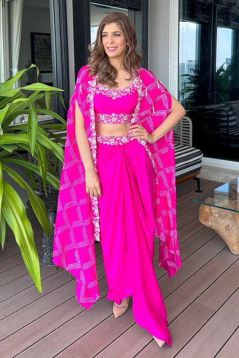 Hot Pink Traditional Outfits, Drape Skirt With Cape, Haldi Pink Outfit, Haldi Outfit Pink, Pink Indian Outfit, Mehandi Outfits, Skirt Cape, Pink Colour Dress, Asymmetric Kurta