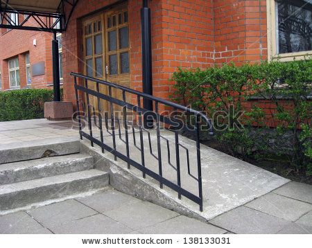 Building entrance with ramp for disabled person wheelchair by Grandpa, via ShutterStock Porch With Ramp, Wheelchair Ramp Design, Outdoor Ramp, Ramp Stairs, Ramp Design, Building Entrance, Wheelchair Ramp, Dog Ramp, Building A Shed