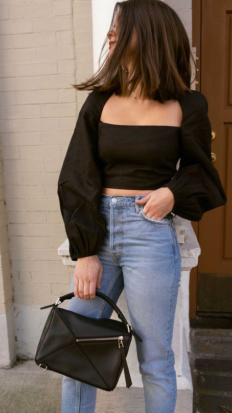 Sarah Butler of Sarah Styles Seattle wears Mara Hoffman Moon Crop Top with Gathered puff sleeves in black and Loewe Small Puzzle Shoulder Bag  | @sarahchristine, Seattle Blogger Puff Sleeve Top Outfit, Sarah Christine, Black Top Outfit, Off The Shoulder Top Outfit, Shoulder Tops Outfit, Seattle Fashion, Crop Top With Jeans, Crop Top Outfits, Looks Vintage