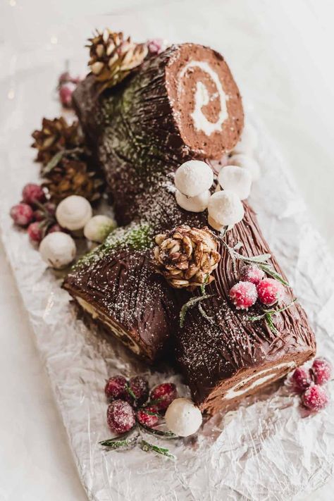 Completed Buche de Noel yule log cake with decorations on foil. Yule Log Recipe, Christmas Yule Log, Chocolate Yule Log, Yule Log Cake, Korean Dessert, Cakes To Make, Cake Roll Recipes, Chocolate Sponge Cake, Log Cake