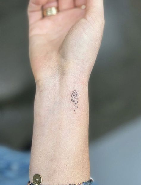 Dainty Front Shoulder Tattoo, Tiny Rose Hand Tattoo, Rose Tattoo Small Wrist, Runuculous Flower Tattoo, Rose Initial Tattoo, Small Fine Line Rose Tattoo, Tiny Rose Tattoo Wrist, Small Tattoo For Daughter, Minimalist Carnation Tattoo