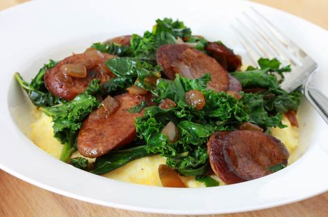 andouille sausage greens cheese grits kale swiss chard recipe Grits With Sausage, Sausage And Greens, Sausage Grits, Cheesy Grits Recipe, Sausage Kale, Swiss Chard Recipes, Cheesy Grits, Chard Recipes, Grits Recipe