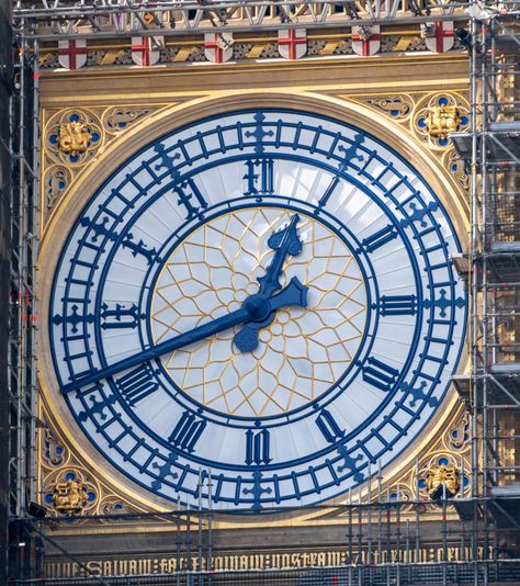 SIX red and white St George shields are revealed on Big Ben’s clock face — as it shows its original colours for the first time in 90 years. But the restoration of the flags — painted black in the 30s after the original colours were lost under pollution — sparked anger from the Scottish National […] London In January, St George Flag, Victorian Clocks, Giant Clock, Big Ben Clock, Flag Painting, St James' Park, London Landmarks, Century City