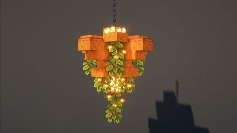 10 Beautiful Minecraft Chandelier Design Ideas - Gamer Empire Cute Minecraft Lantern Ideas, Minecraft Decor Ideas Outside, Minecraft Big Chandelier, Minecraft Fairy Lamp Post, How To Make A Chandelier In Minecraft, Minecraft Enchanting Setup, Minecraft Shandalers, Floating Lantern Minecraft, Mc Decoration Ideas