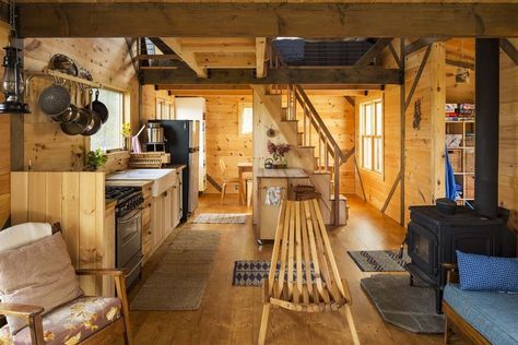 This minimal off the grid cabin retreat was designed by SALA Architects and built by Wee Cabin Company, nestled in the wilderness of Ely, Minnesota. #cabin #livingroom Timber Frame Cabin, Home Gym Design Garage, Building A Cabin, Off Grid Cabin, Sleeping Loft, Traditional Building, Tiny Cabin, Tiny House Movement, A Cabin