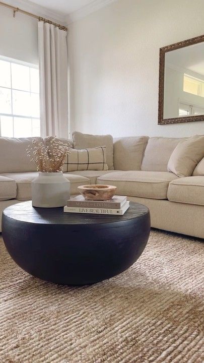 Modern Coffee Tables Black, Coffee Table Decor Dark Wood, Decorate Black Coffee Table, Black Coffee Table Decor Living Room, How To Style Ottoman Coffee Table, Round Black Wood Coffee Table, Round Solid Wood Coffee Table, Dark Round Coffee Table, Styling Black Coffee Table