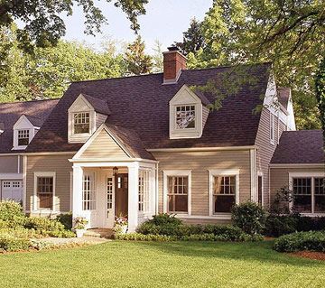 Pediment and Dormers  A portico flanked by columns and topped with a pediment adds visual interest to this home's facade. The angles of the pediment repeat those of the dormers. Cape Cod Exterior, Cape Cod House Exterior, Cape Cod Cottage, Exterior House Remodel, House Front Porch, Cape Cod Style House, Cape Cod Style, Cape House, Cape Cod House