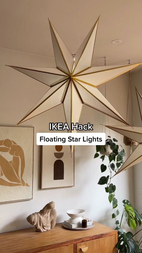 DIY Floating Star Lights This simple IKEA hack took me about 30 minut... | Starlights | TikTok Ikea Christmas Stars, Stars Lights Decoration, Ikea Star Lights Paper Lanterns, Paper Star Lanterns Bedroom, Ikea Stars Christmas, Ikea Star Lights, Ikea Strala Star Ideas, Scandinavian Christmas Decorations Diy Paper Stars, Diy Moravian Star