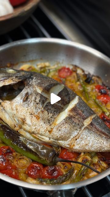 Sofia Misabishvili on Instagram: "Dorado (Easy and Tasty)

Ingredients:
-1 Dorado 400-500 g
-2 garlic cloves 
-15 cherry tomatoes 
-One stalk of leek
-5-7 asparagus 
-Salt and pepper to taste 
-Olive oil 3 tbsp
-White wine 200 ml (optional)

Heat some olive oil in a pan and sauté all the vegetables for 5-7 minutes. Then, place the fish on top of the vegetables and put the dish in a preheated oven at 210°C-410F  for 15 minutes.

☝️The cooking time for Dorado fish in the oven depends on its size and thickness. To check for doneness, insert a fork at the thickest part of the fish and gently twist. If the fish flakes easily and appears opaque, it is cooked through. Additionally, the internal temperature of the Dorado fish should reach 145°F (63°C) to ensure it is safe to eat. Overcooking can r Dry Fish Recipes, Fish In The Oven, Dorado Fish, Iranian Recipes, White Fish Recipes, Shellfish Recipes, Baked Fish, Dessert Dishes, 7 Minutes