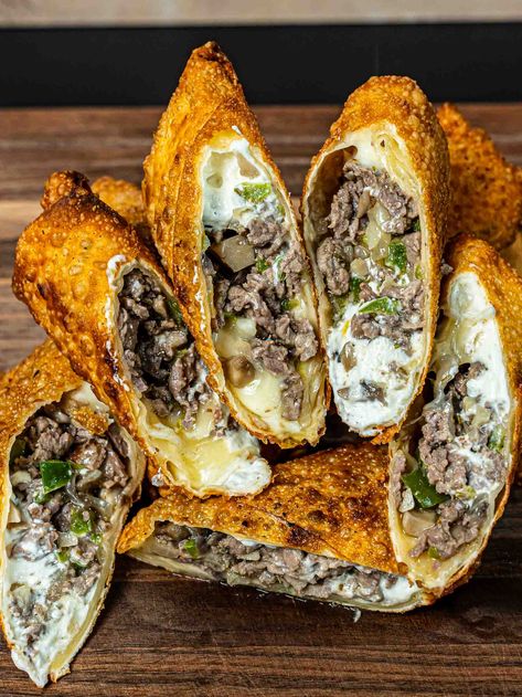 Philly Cheesesteak Egg Rolls Philly Cheesestake Egg Rolls, Chicken Philly Cheesesteak Eggrolls, Puff Pastry Egg Rolls, Philly Cheese Steak Roll Ups, Philly Cheesecake Eggrolls, Cheese Steak Egg Rolls Air Fryer, Egg Rolls Filled With Philly Cheesesteak, Mushroom Egg Rolls, Bomb Dinner Recipes