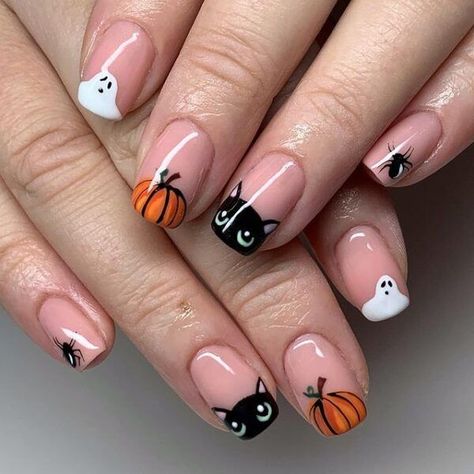 50  Spooky Halloween Nails You Need To Try! This includes halloween nails acrylic, halloween nails ideas, halloween nails short, halloween nails simple, halloween nails acrylic coffin, halloween nails easy, halloween nails 2021 and more! This also includes cute halloween nails, easy halloween nails, halloween nail designs, halloween nail art, halloween nail ideas simple, halloween nail ideas, simple halloween nails and more! #halloweennails #halloweennailart, #halloweennailideas Nail For Halloween, Minimalist Nails Halloween, Nail Art Halloween Easy, Little Ghost Nails, Cat Nails Halloween, Halloween Nails Minimalist, Halloween Cat Nail Art, Halloween Tip Nails, Minimalistic Halloween Nails