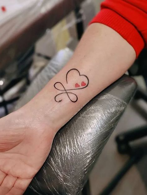 100 Awesome Heart Tattoos For Inspiration - The Trend Scout Three Hearts Tattoo Wrist, Hummingbird Heart Tattoo, Flower And Heart Tattoos, Tattoo Ideas Female Heart, Small Heart Tattoos For Women, Love Heart Tattoo Designs, Commemorative Tattoo, Three Hearts Tattoo, Heart Tattoos For Women