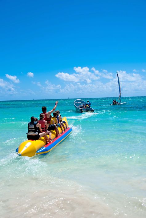 Whenever she goes jet skiing she brings the banana boat and takes her family and friends with her to have a good time and create memories. Banana Boat Aesthetic, Banana Boat Ride, Grand Bahama Island, Banana Boats, Banana Beach, Jet Skiing, Coral Beach, Thrill Seeking, Grand Bahama