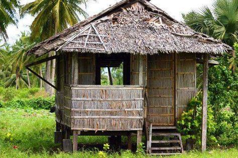 The Nipa hut (Bahay Kubo) is one of the older forms of housing in the Philippines. It is made with materials such as bamboo, coconut wood, cogon grass, and nipa palm leaves and coconut fronds as roof thatching. Most huts are built on stilts due to frequent flooding during the rainy season. Bahay Kubo Photography, Pre Colonial Philippines Architecture, Raised Architecture, Bahay Kubo Philippines, Small Hut House, Ifugao House, Nipa House, Bahay Kubo Design Philippines, Filipino Houses