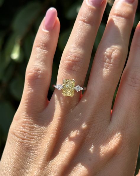 Swipe for more angles of this stunning yellow Radiant cut. 2.57ct yellow radiant cut diamond with kite side stones set in 14k yellow gold & platinum. #radiantcut #radiantcutdiamond #radiantcutdiamond #engagementring #diamondring #proposal #showmeyourrings #gettingmarried #howtheyasked #bridetobe #theknotrings #imengaged #theysaidyes #isaidyes #engaged #customjewelry #finejewelry Kite Side Stones, Engagement Rings Radiant Cut, Engagement Rings Radiant, Radiant Ring, Canary Diamond, Radiant Cut Engagement Rings, Radiant Cut Diamond, Radiant Cut, Yellow Sapphire