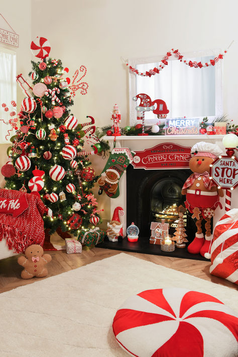 Celebrate a sweet Christmas with our Candy Cane Lane Collection this winter. Full of traditional reds and whites, this joyful collection is filled with a variety of stylish and bold baubles, ribbons, garlands, baubles and, of course, delicous-looking candy canes. Candy Cane Christmas Aesthetic, Candy Cane Decor Ideas, Christmas Decor Ideas Candyland, Tacky Christmas Decorations, Candy Cane Theme Decorations, Colorful Candy Photography, Candy Cane Christmas Theme, Candy Cane Lane Theme, Candy Cane Lane Christmas Decor