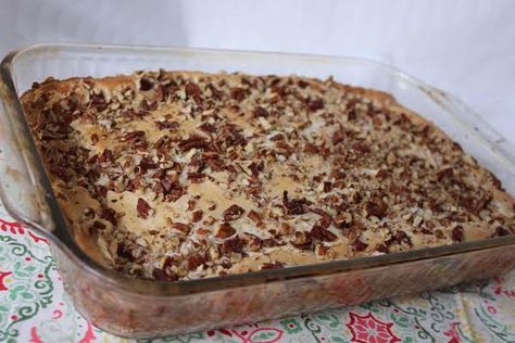 Bake for 40 to 50 minutes. You want the center to be a little... Crock Pot Candy, Homemade Yellow Cake, Ooey Gooey Butter Cake, Pumpkin Pie Cake, Gooey Cake, Crockpot Candy, Butter Pecan Cake, Cream Cheese Topping, Magic Bars