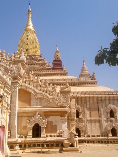 The Ananda Temple is a Buddhist temple located in Bagan, Myanmar. It was built in the early 12th century and is considered to be one of the finest and best-preserved temples in the region. The temple features four standing Buddhas and stunning architecture that reflects the transition from Indian to Burmese style. Golden Temple Architecture, Ananda Temple, Modhera Sun Temple Photography, Burmese Architecture, Mukesh Ambani House Temple, Nagara Style Temple Architecture, Bagan Temples, Bagan Myanmar, Standing Buddha