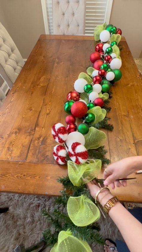 How To Make Whoville Houses, Grinch Stair Garland, Whoville Christmas Garland, The Grinch Decor Ideas, The Grinch Garland, Diy Grinch Christmas Garland, Grinch Fireplace Decorating Ideas, Grinch Themed Decorations, Grinch Table Decorations Diy